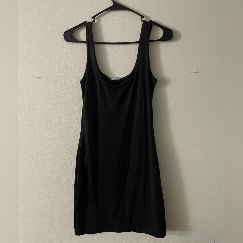 Rue 21 NWOT black bodycon dress size M